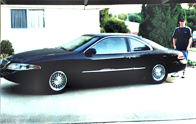 1995_Lincoln_Mark_VIII_late_90s_Long_Beach.jpg